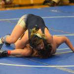Soldotna High School sophomore Trinity Donovan wrestles in the state championship in Chugiak, Alaska on Saturday, May 22, 2021. (Camille Botello / Peninsula Clarion)