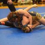 Homer High School sophomore Aileen Lester wrestles in the state championship in Chugiak, Alaska on Saturday, May 22, 2021. (Camille Botello / Peninsula Clarion)