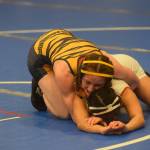 Homer High School senior Sadie Blake wrestles in the state championship in Chugiak, Alaska on Saturday, May 22, 2021. (Camille Botello / Peninsula Clarion)