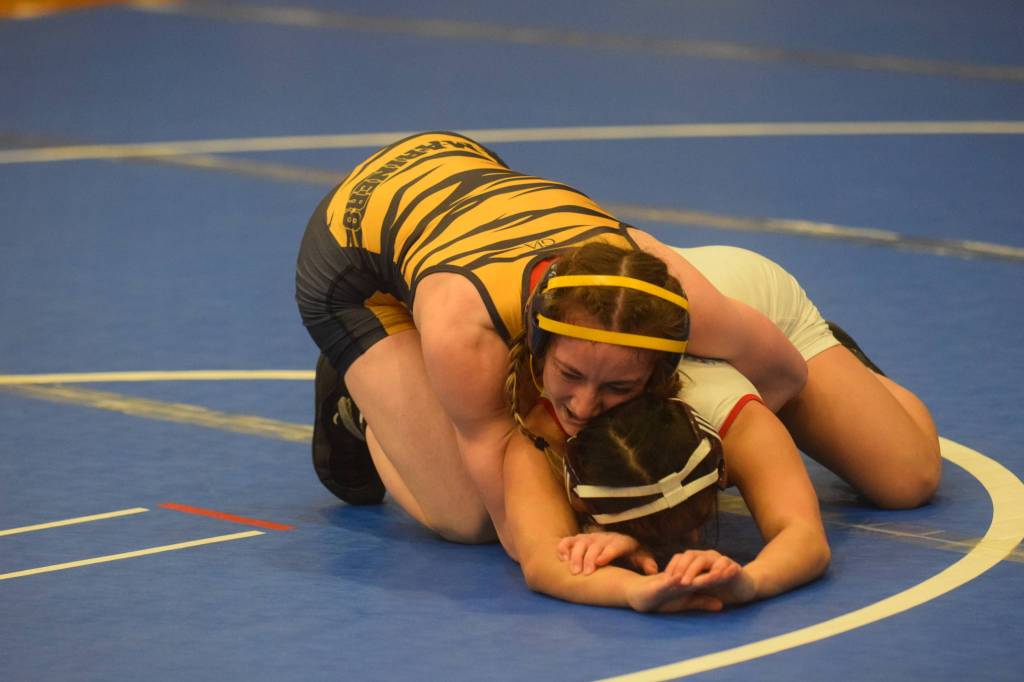 Homer High School senior Sadie Blake wrestles in the state championship in Chugiak, Alaska on Saturday, May 22, 2021. (Camille Botello / Peninsula Clarion)