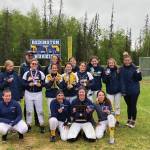 The Homer Mariner softball team celebrates after winning the Northern Lights Conference in an 18-17 win over Kodaik. (Photo courtesy Homer Mariner Softball team)