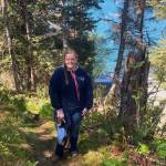 Sarah Knapp stands on South Eldred Trail looking over the Kachemak Bay on National Trails Day. (Photo by Michael Singer)