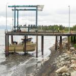 A boat is lifted out of the water at Northern Enterprises Boat Yard on Kachemak Drive. (Photo by Sarah Knapp/Homer News)
