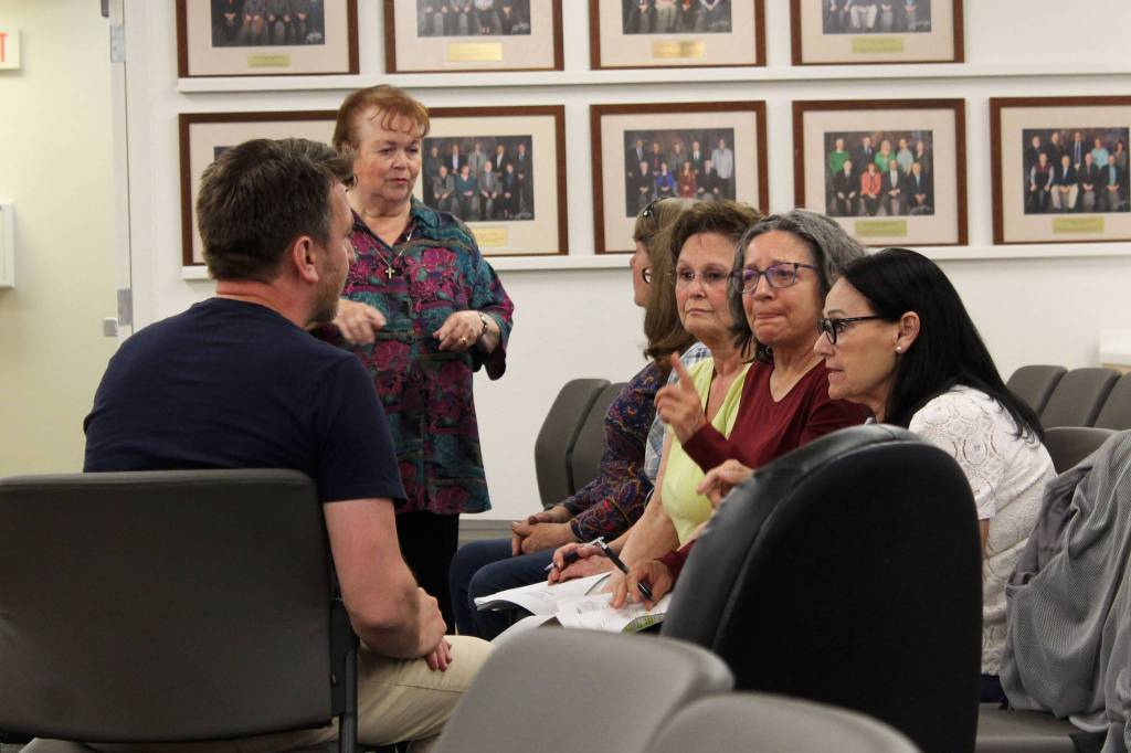 Kenai Peninsula Borough IT Director Ben Hanson speaks with attendees at a meeting of the Kenai Peninsula Borough Assembly on Tuesday, June 15, 2021, at the Betty J. Glick Assembly Chambers in Soldotna, Alaska. The attendees were concerned about voting measures approved by the assembly aimed at improving borough election security. (Ashlyn OHara/Peninsula Borough)