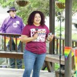 Xochitl Lopez-Ayala speaks on Saturday, June 19, 2021, at a combined Pride and Juneteenth event at Wisdom, Knowledge, Faith and Love Park in Homer, Alaska. (Photo by Michael Armstrong/Homer News)