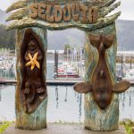 The Seldovia archway is one of the first landmarks visitors see when stepping off the boat. (Photo by Sarah Knapp/Homer News)