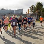 Participants of the Homer Spit Run half marathon begin the race at Lands End. Thirty-two runners participated in the half marathon. (Photo by Sarah Knapp/Homer News)
