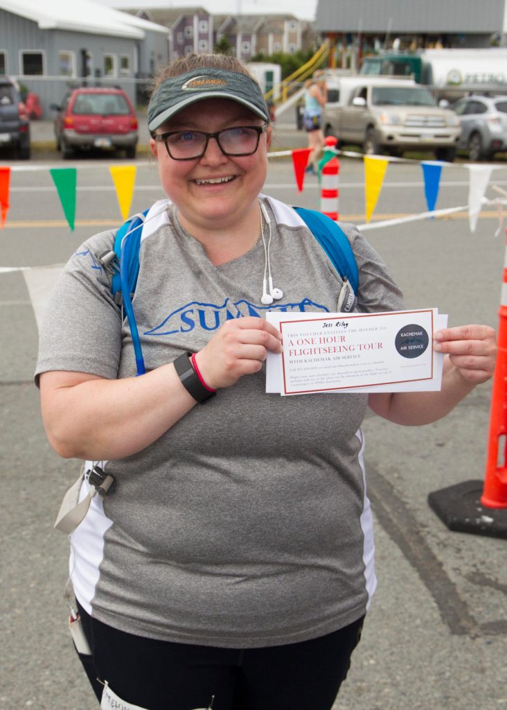 Jess Riley, who walked in the untimed 10K on June 26, was randomly selected to win a Homer Flightseeing trip from Kachemak Air Service. (Photo by Sarah Knapp/Homer News)