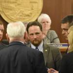 Members of the House Republican Minority Caucus talk amongst themselves during an at ease on the floor of the Alaska House of Representatives on Monday, June 28, 2021. House members reached a deal on an operating budget and avoided a government shutdown but members of the minority said they had been repeatedly pushed out of the process. (Peter Segall / Juneau Empire)