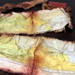 A map recovered from the 1952 crash of a C-124 Globemaster was found this month on Colony Glacier and displayed at Joint Base Elmendorf-Richardson, Alaska, Tuesday, Sept. 29, 2021. The plane slammed into a mountain, killing 52 on board, and the plane and its crew have since become part of the glacier. The military has conducted annual summer recovery efforts, finding human remains and personal items on the glacier. (AP Photo/Mark Thiessen)