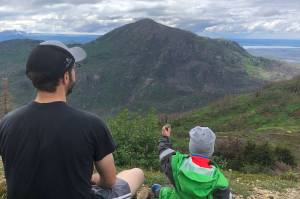 The authors husband, Quinn Dale (left), and son, Hawkin, enjoy the view from Skyline trail on Saturday, in Cooper Landing. (Photo by Tressa Dale/Peninsula Clarion)