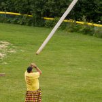A competitor throws the caber during the caber toss at the 2021 Kachemak Bay Highland Games on Saturday, July 3. (Photo by Sarah Knapp/Homer News)