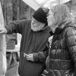Photo by Christina Whiting 
Sara Berg, right, talks with artist Brad Hughes, left, at Hughes Homer studio in June 2021 about the Loved & Lost Memorial Bench project Berg and other family and friends of Anesha Murnane commissioned to honor Murnane and other missing women and children.