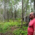 Walt Blauvelt stands among trees near the Central Peninsula Landfill on Thursday, July 1, 2021 near Soldotna, Alaska. (Ashlyn OHara/Peninsula Clarion)