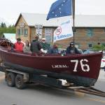 No. 76, along with Tim Troll, center, Dave Seaman, right, and friends, sails down Pioneer Avenue in Homers Fourth of July parade on July 4, 2021, in Homer, Alaska. (Photo by Ben Mitchell)