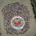 SalmonSolidarity, an aerial art action organized by Mavis Muller, was held Aug. 2, 2014, in the Rodeo arena of the Kenai Peninsula Fairgrounds at Salmonfest in Ninilchik, Alaska. (Photo by Bjorn Olson and courtesy of Mavis Muller)