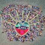 Photo G. Brad Lewis and courtesy of Mavis Muller 
AerialHeart, an art action organized by Mavis Muller, was held on Aug 3, 2015, in the rodeo arena at Kenai Peninsula Fairgrounds for Salmonfest in Ninilchik, Alaska.
