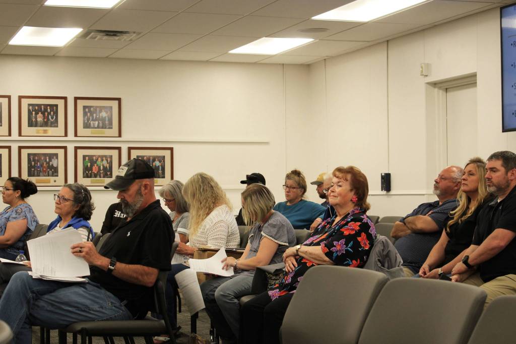 People attend a meeting of the Kenai Peninsula Borough School District Board of Education on Monday, August 2, 2021 in Soldotna, Alaska. (Ashlyn O'Hara/Peninsula Clarion)