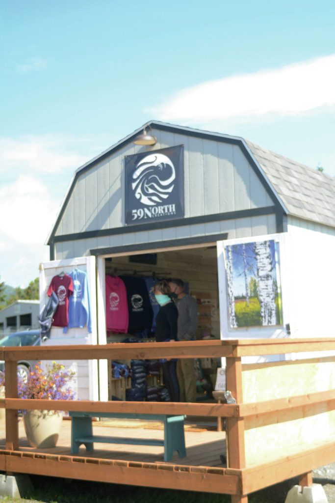Customers browse in Tracy Hansens Ocean Drive shop, 59 North, on Tuesday, Aug. 10, 2021, in Homer, Alaska. (Photo by Michael Armstrong/Homer News)