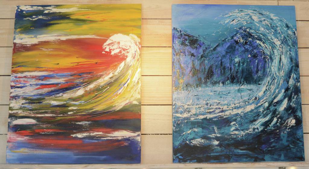 Two of Tracy Hansens more recent paintings, Waves of Emotion: Anxiety, left, and Waves of Emotion: Peace, right, are on display Tuesday, Aug. 11, 2021, at her shop, 59 North, in Homer, Alaska. (Photo by Michael Armstrong/Homer News)
