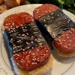 Spam, seaweed and sticky rice combine to make one of Hawaiis most iconic road snacks. (Photo by Tressa Dale/Peninsula Clarion)