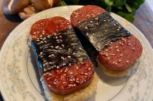 Spam, seaweed and sticky rice combine to make one of Hawaiis most iconic road snacks. (Photo by Tressa Dale/Peninsula Clarion)