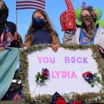 Kids hold a sign cheering on 17-year-old Lydia Jacoby, who earned a gold and silver medal in the 2020 Olympics in Tokyo, Japan, on Thursday, Aug. 5, 2021. (Photo by Ashlyn OHara/Peninsula Clarion)