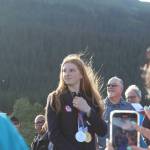 Olympic gold medalist Lydia Jacoby waves to the crowd in Seward during her celebratory parade on Thursday, August 5, 2021. (Ashlyn OHara/Peninsula Clarion)