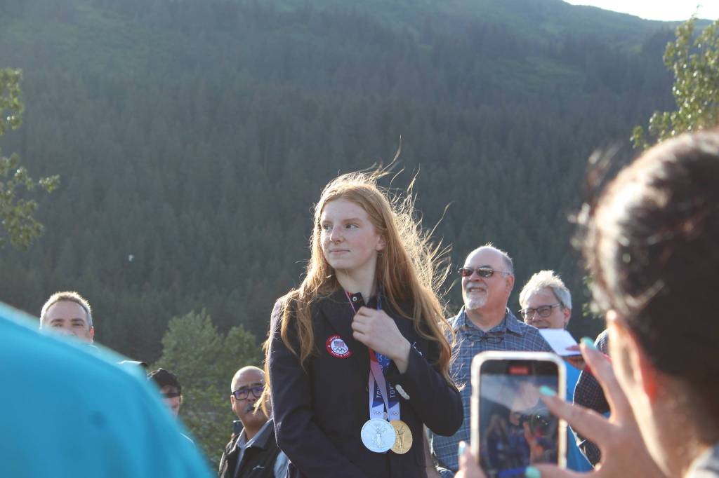 Olympic gold medalist Lydia Jacoby waves to the crowd in Seward during her celebratory parade on Thursday, August 5, 2021. (Ashlyn OHara/Peninsula Clarion)