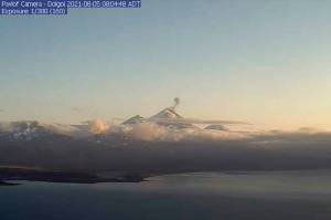 In this webcam image provided by the Alaska Volcano Observatory, is the Pavlof Volcano in a state of eruption with episodic low-level ash emissions on Thursday, Aug. 5, 2021. Three remote Alaska volcanos are each in a state of eruption, one producing lava and the other two blowing steam and ash. So far, no small communities near any of the three have been impacted, Chris Waythomas, a geologist with the Alaska Volcano Observatory, said Thursday. (Alaska Volcano Observatory via AP)