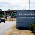 A single vehicle heads into the U.S. at the quiet Peace Arch border crossing Monday, Aug. 9, 2021, in Blaine, Wash. Canada lifted its prohibition on Americans crossing the border to shop, vacation or visit, but America kept similar restrictions in place, part of a bumpy return to normalcy from coronavirus travel bans. (AP Photo/Elaine Thompson)