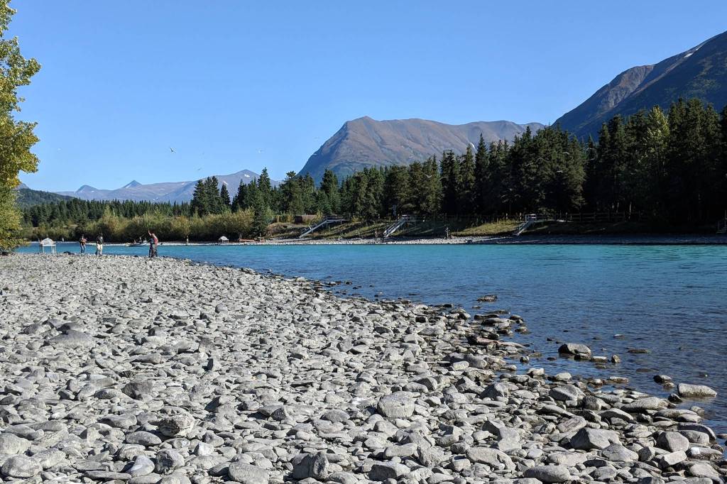 Anglers gather along the banks of the Kenai River near Sportsmans Landing in Cooper Landing in September 2018. (Peninsula Clarion file)