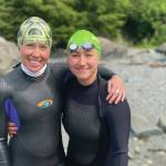 Photo by Cassidy Carroll 
Jessie Goodrich, left, and Lauren Kuhns, right, pose on Aug, 8, 2021, after swimming in the Change Your Latitude 10 km open ocean swim in Sitka. Goodrich is a Homer open ocean swimmer and Kuhns is a Homer woman attending Assumption College in Worchester, Massachusetts.
