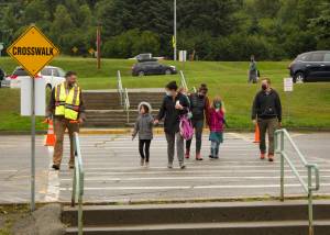 Parents walk their children to their first day of school at Paul Banks Elementary School on Aug. 17, 2021. (Photo by Sarah Knapp/Homer News)