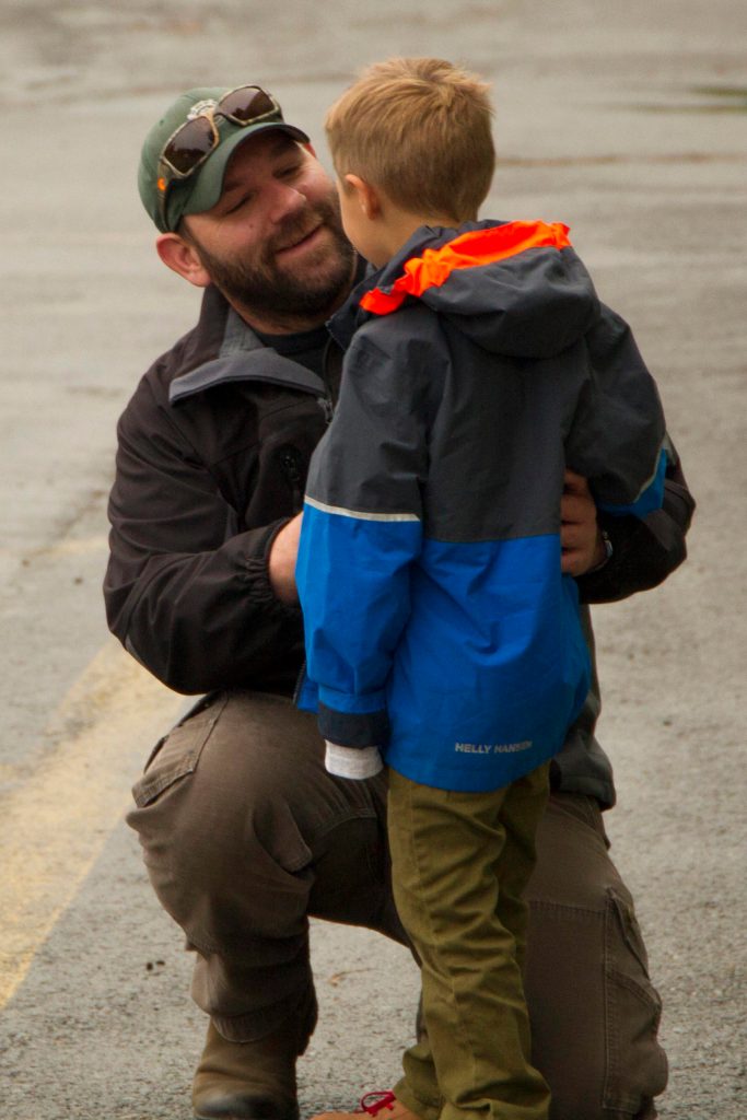 A dad reassures his son that his first day of school at Paul Banks Elementary School will go well. (Photo by Sarah Knapp/Homer News)