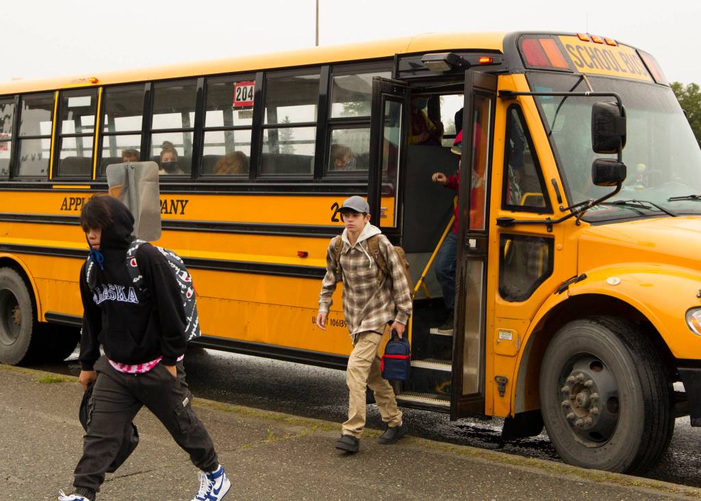 Homer High School students get off the bus for the first day of school. (Photo by Sarah Knapp/Homer News)