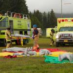 Emergency responders participate in a mass casualty emergency drill at Homer Airport on Tuesday, Aug. 24. The responders were responsible for recovering victims from a mock plane crash, triaging and transporting them to medical facilities. (Photo by Sarah Knapp/Homer News)