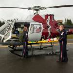 Guardian Flight emergency responders triage a mock childs wounds before transporting them to a medical facility. (Photo by Sarah Knapp/Homer News)