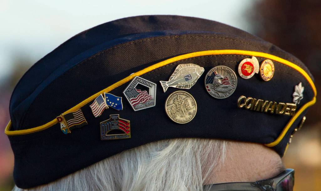 Eileen Faulkners military cover features Sept. 11 memorial pins. (Photo by Sarah Knapp/Homer News)