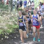 Homers Frida Renner competes during the varsity girls race of the George Plumley Invitational on Saturday, Sept. 11, 2021, at Palmer High School. (Photo by Jeremiah Bartz/Frontiersman)