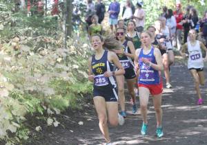 Homers Frida Renner competes during the varsity girls race of the George Plumley Invitational on Saturday, Sept. 11, 2021, at Palmer High School. (Photo by Jeremiah Bartz/Frontiersman)