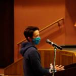 Brie Drummond speaks in support of mask mandates on Monday, Sept. 13, for the Kenai Peninsula School Board meeting at Homer High School in Homer, Alaska. During a work session before the meeting, the district presented revisions to its COVID-19 mitigation protocols. (Photo by Michael Armstrong/Homer News)