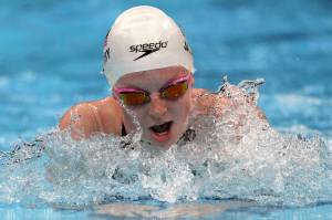 Lydia Jacoby of the United States swims in a heat during the womens 100-meter breaststroke at the 2020 Summer Olympics, Sunday, July 25, 2021, in Tokyo, Japan. (AP Photo/Matthias Schrader)