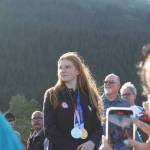 Olympic gold medalist Lydia Jacoby waves to the crowd in Seward during her celebratory parade on Thursday, Aug. 5, 2021. (Ashlyn OHara/Peninsula Clarion)