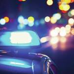 A patrol vehicle driven by a Juneau Police Department officer struck a pedestrian on Thursday night, resulting in minor injuries. (Michael Penn / Juneau Empire File)