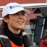 Ben Hohenstatt / Juneau Empire
Zara Rutherford smiles outside her aircraft while talking to a small crowd that gathered at Ward Air to greet her. Rutherford said the public nature of her effort to fly around the world means that there is often a group gathered when she lands. Its really nice seeing all of these people, she said.