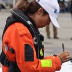 Ben Hohenstatt / Juneau Empire
Zara Rutherford signs a phone case for a member of a small crowd that gathered Saturday to greet the young pilot who is attempting to fly around the world.