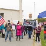 Homer community members join together to march from the HERC Campus to WKFL Park in support of womens reproductive rights. More than 100 people joined in on the march. (Photo by Sarah Knapp/Homer News)