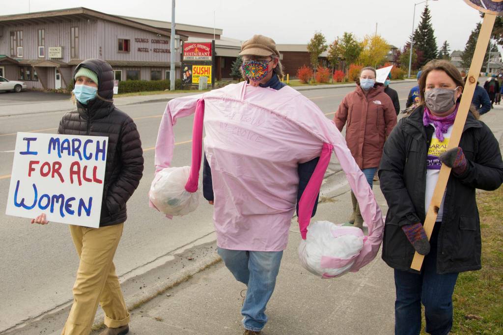 A person dressed as a uterus participates in the Homer Womens March on Saturday, Oct. 2. (Photo by Sarah Knapp/Homer News)
