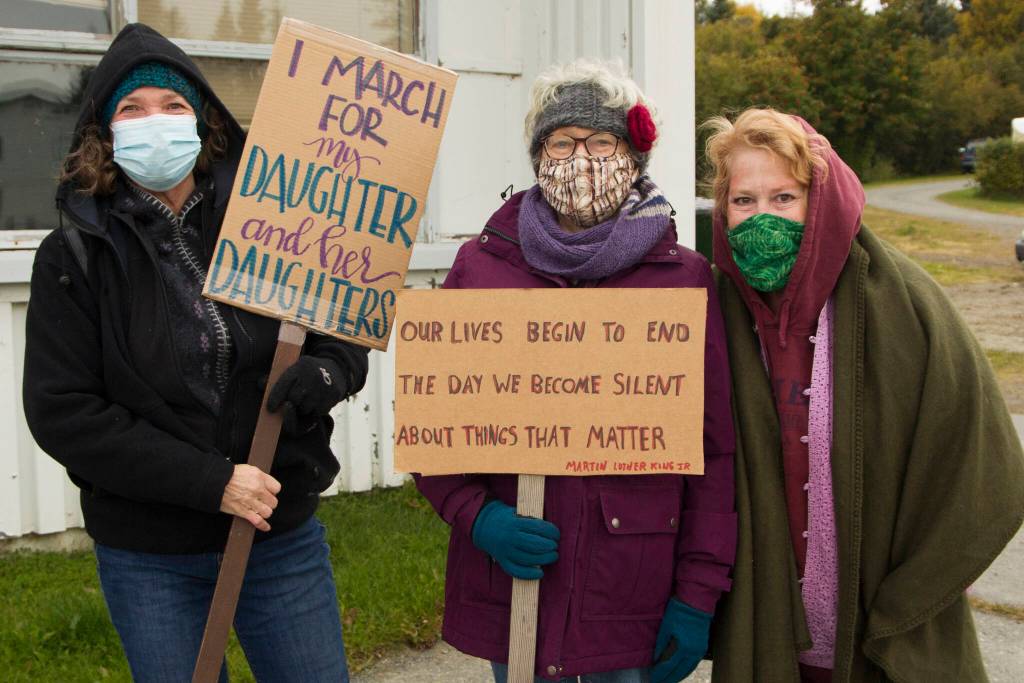 Terri Leman, Virginia, and Ginger Bryant marched this Saturday for the same rights they say theyve been fighting for their entire lives: the ability for women to choose for themselves what to do with their bodies. (Photo by Sarah Knapp/Homer News)
